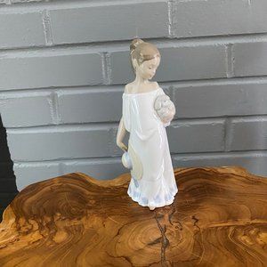 NAO by Lladro Porcelain Figurine, Young Girl Holding a Lamb, 8-1/4" tall